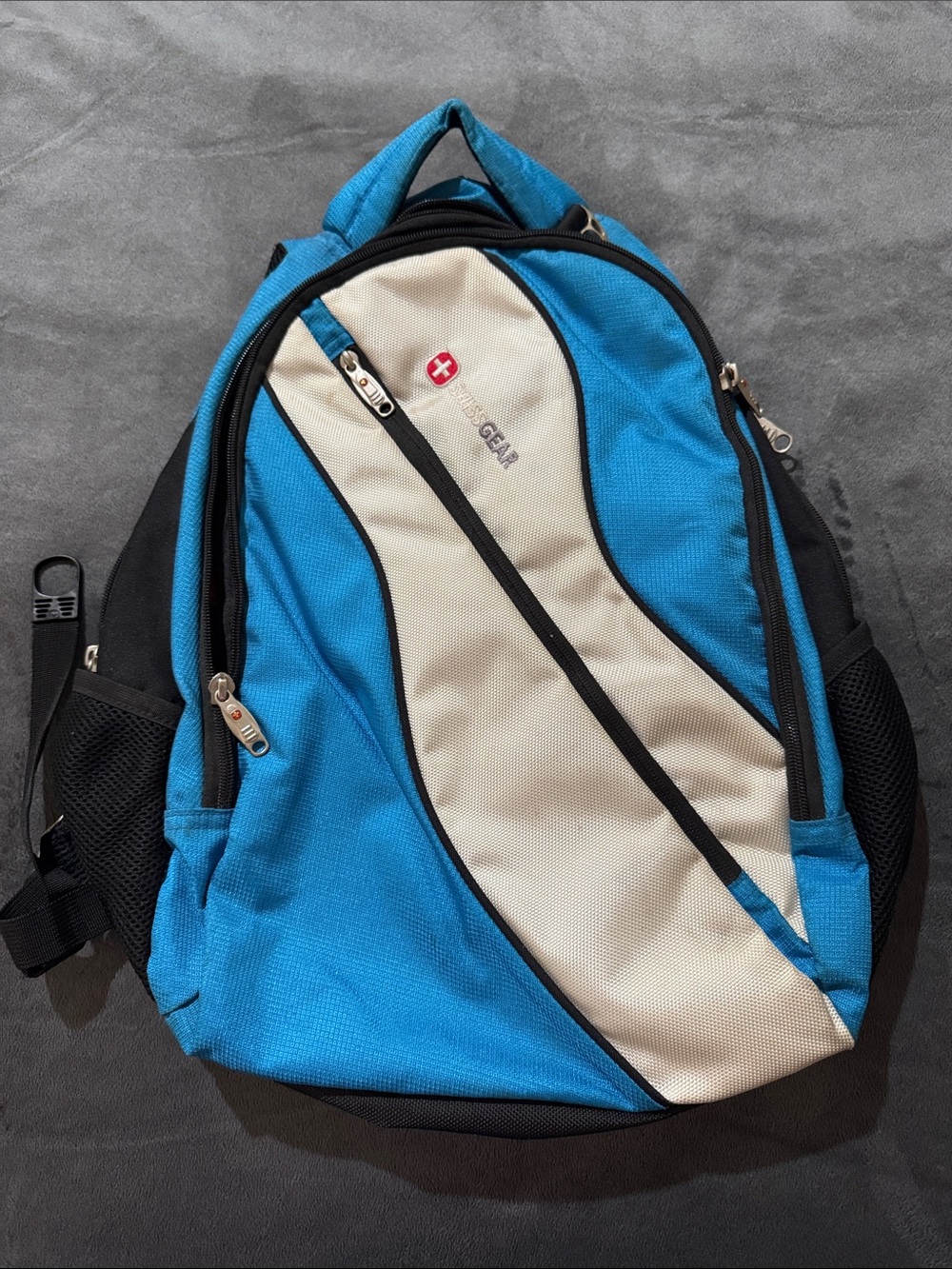 SwissGear Blue and Cream Laptop Backpack with Multiple Pockets